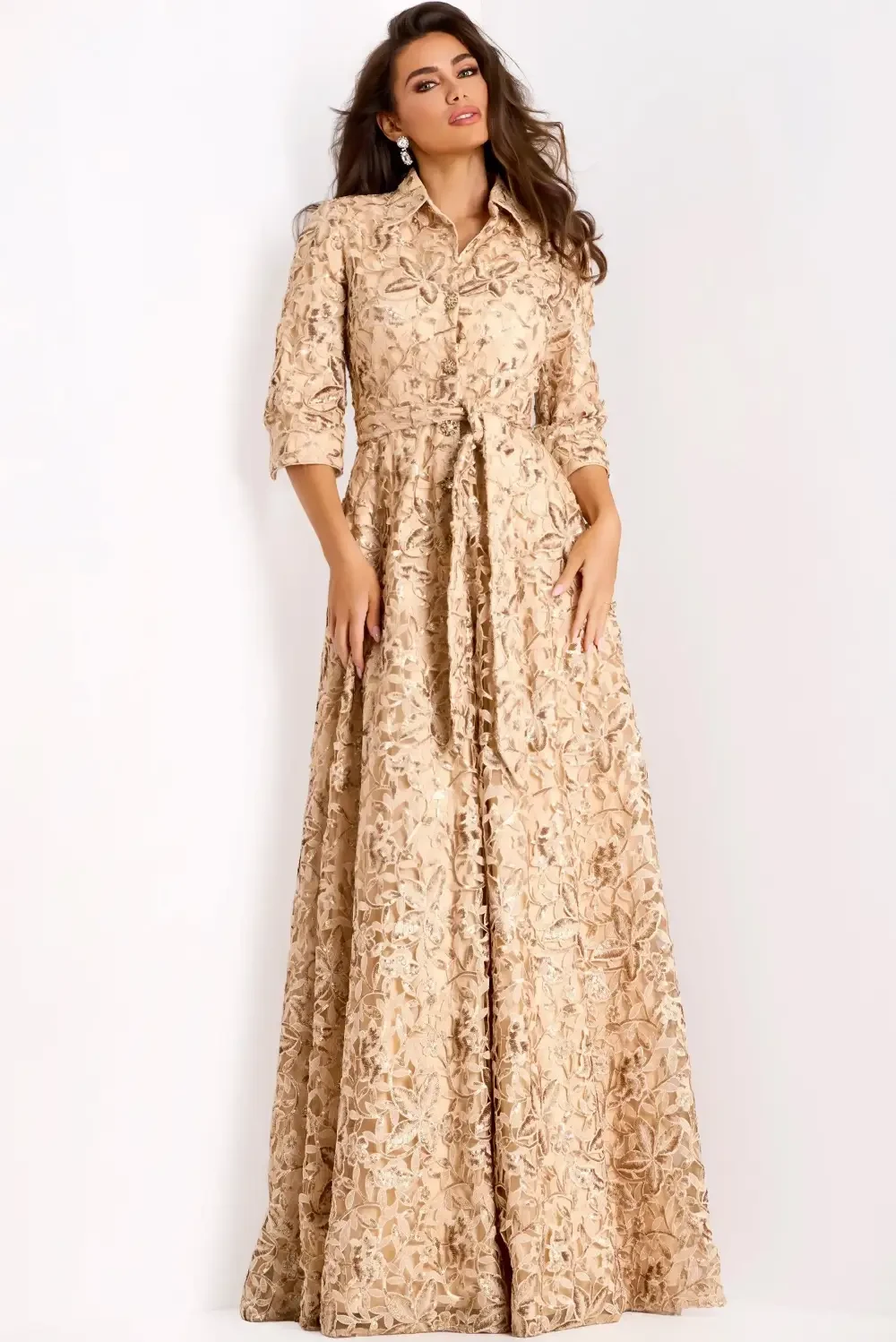 model is wearing a gold mother of the bride gown